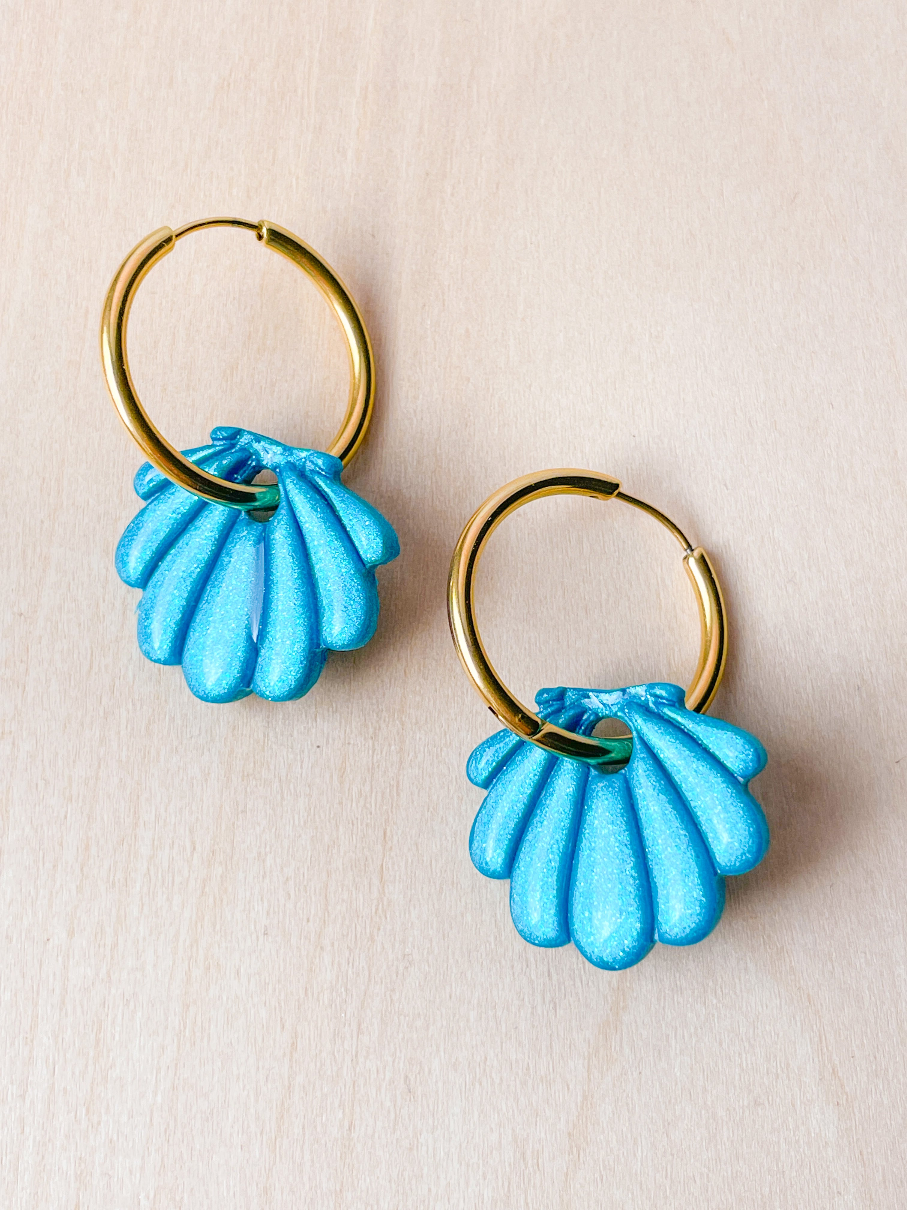 Les Coqys turquoise